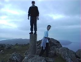 Tao and John at the Triangulation Point at the to of Dun Caan, Isle of Raasay